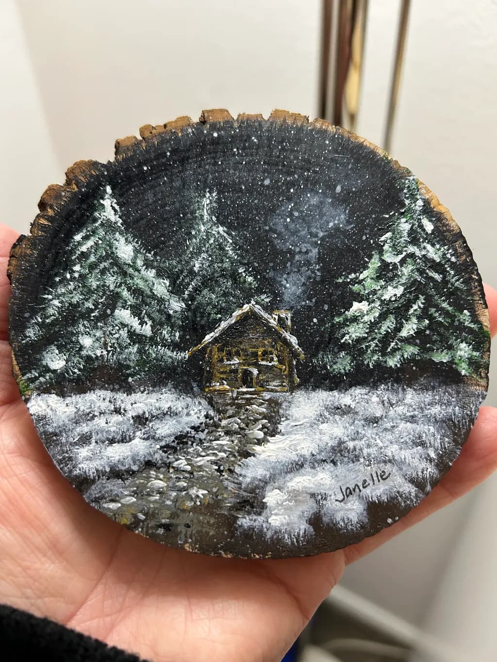 Whispers of Winter: A Cozy Cabin Amidst Snowy Pines