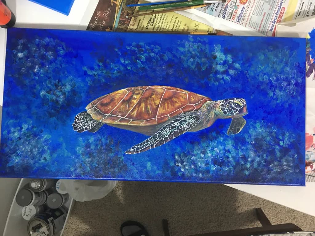 Serene Journey: A Majestic Sea Turtle Gliding Through Vibrant Blue Waters
