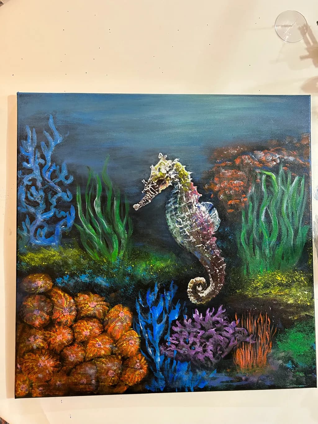 Whimsical Underwater Dance: A Vibrant Seahorse Amidst Coral Gardens