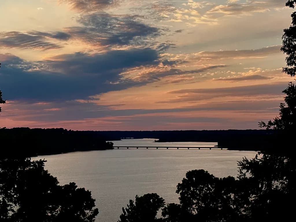 Whispers of Twilight: A Serene Sunset Over the Tranquil Waters