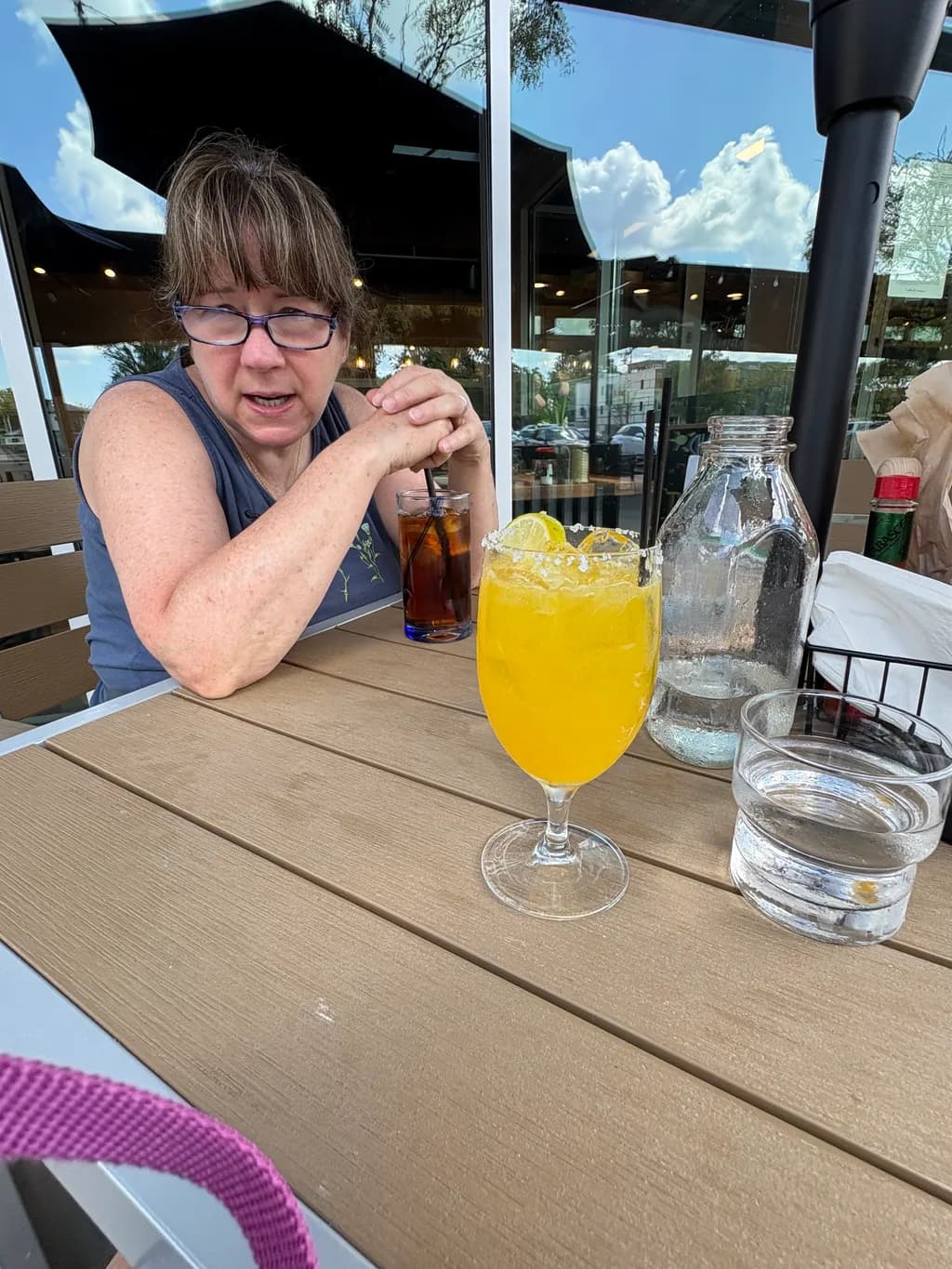 Sunny Sips: A Moment of Refreshment and Reflection at the Café