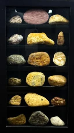 Artistic Display of Natural Stones in a Sleek Frame