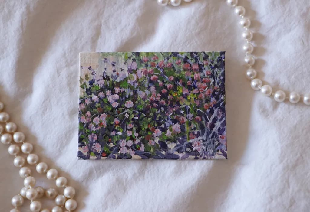 Whispers of Color: A Floral Impression on Canvas
