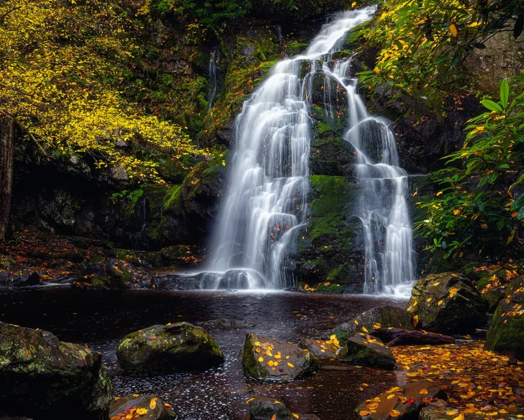 Whispers of Autumn: A Serene Waterfall Retreat in Nature's Embrace