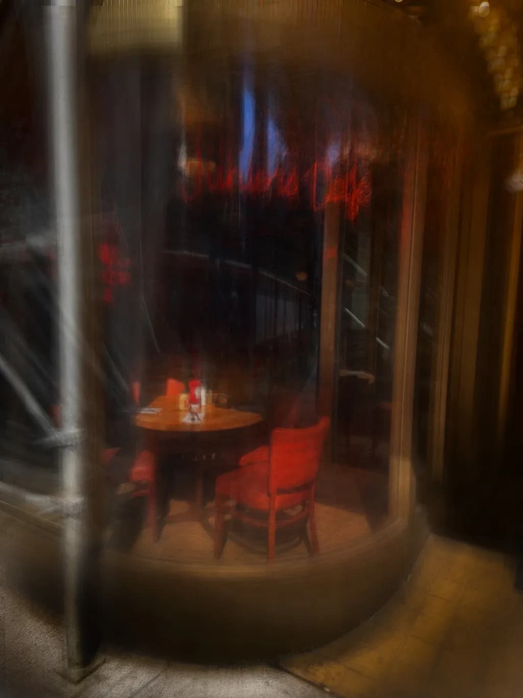 Whispers of the Café: A Dreamy Encounter in Red and Glass