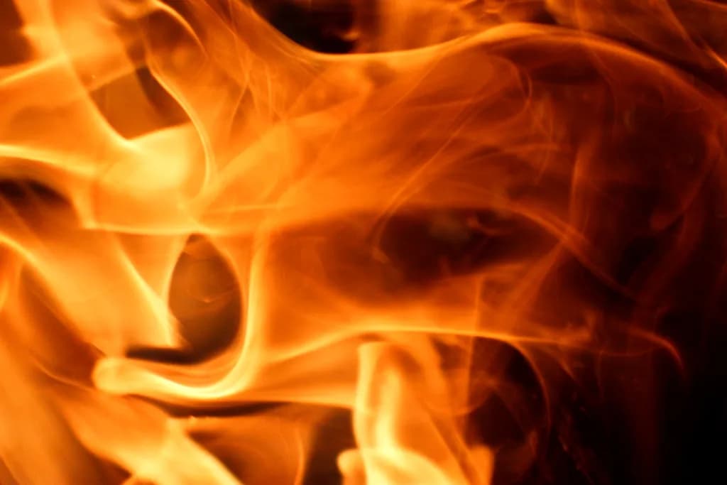 Ethereal Flames: A Dance of Orange Light and Energy