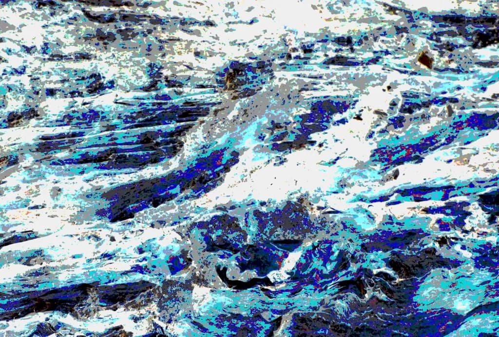 Ocean's Embrace: A Dance of Turquoise Waves and White Foam