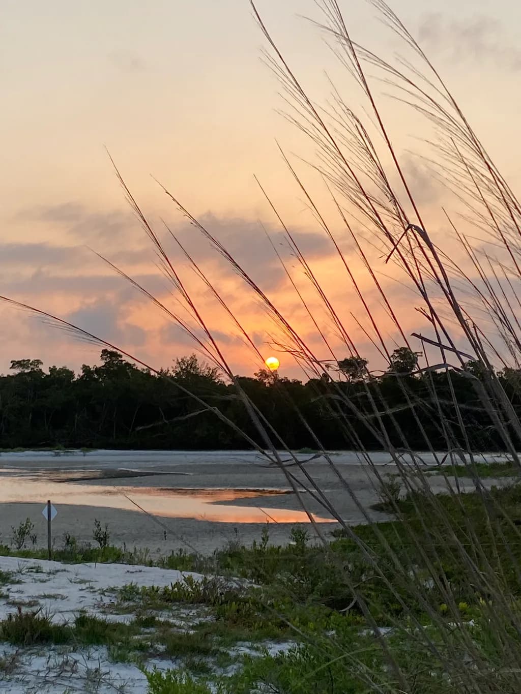 Serene Sunset Reflections: A Tranquil Beach Escape
