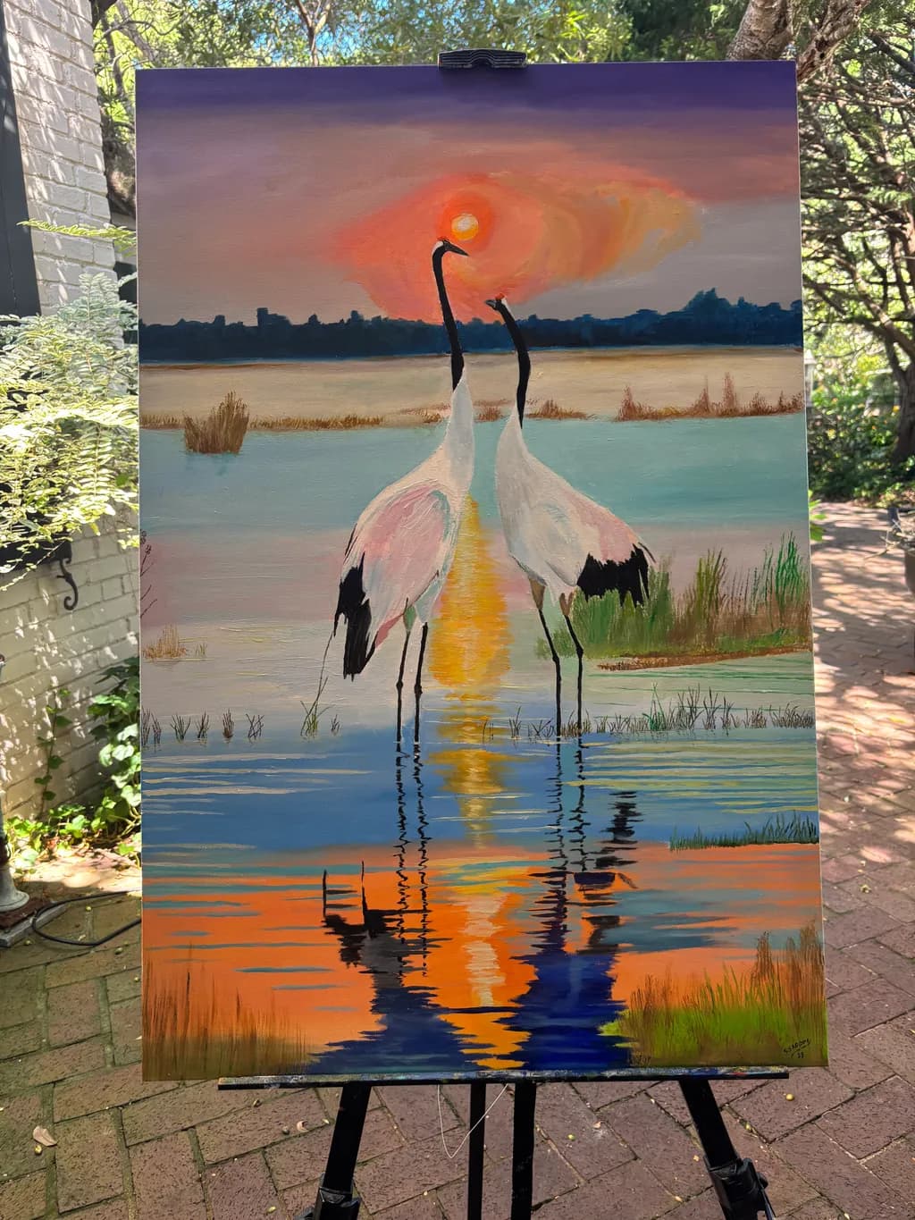 Serenity at Sunset: Cranes Embracing Nature's Reflection