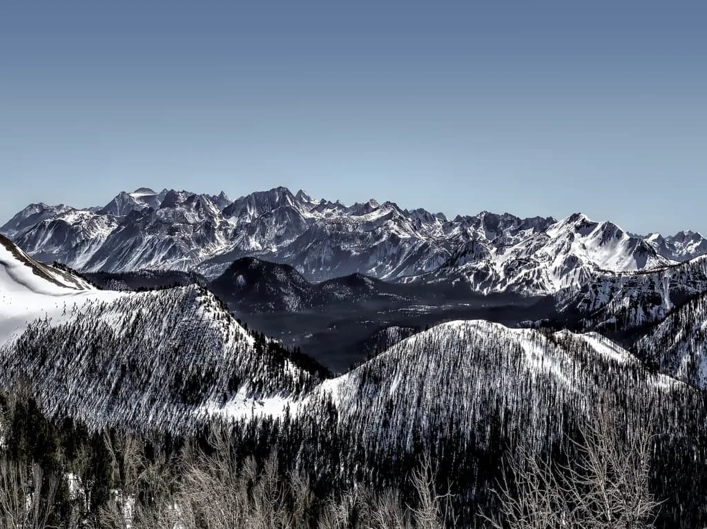 Whispers of Snow-Capped Peaks: A Serene Mountain Landscape Journey