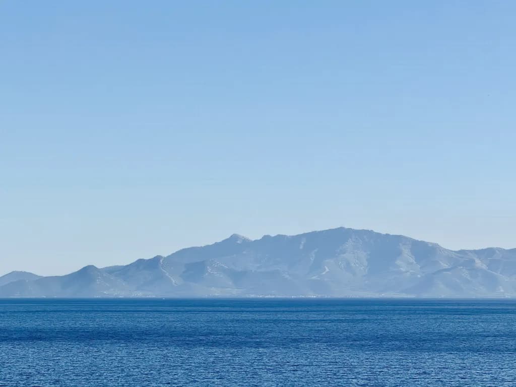 Whispers of the Blue Horizon: A Serene Dance Between Sea and Sky