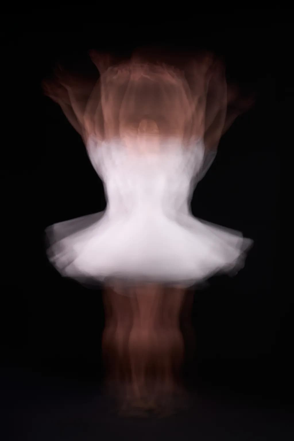Whispers of Grace: A Dance in Motion and Light