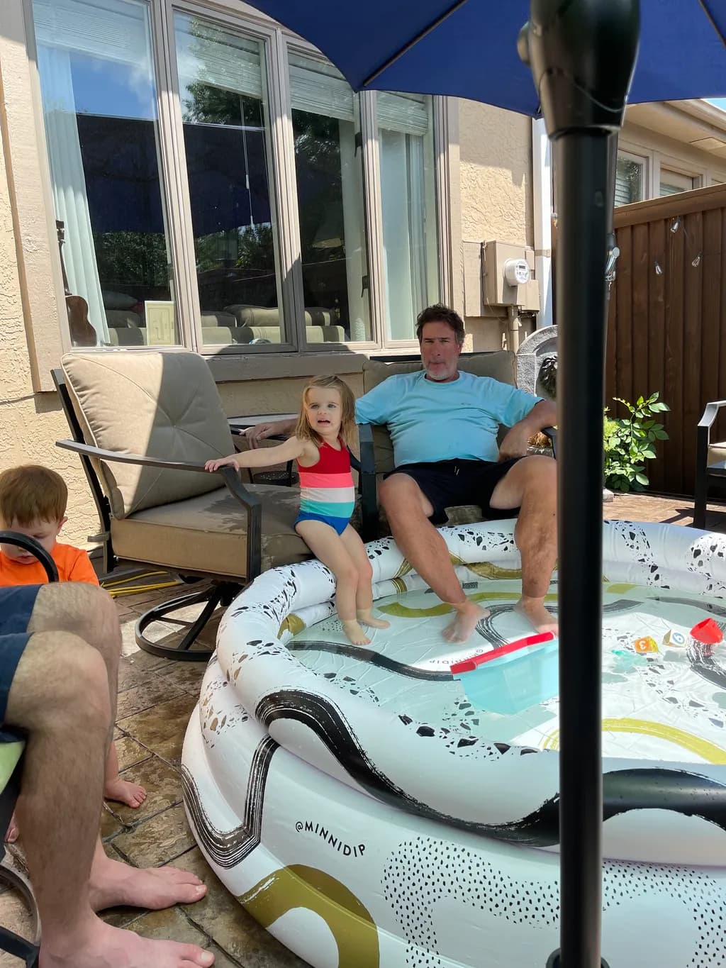 Summer Joy: A Family's Playful Retreat in the Poolside Oasis