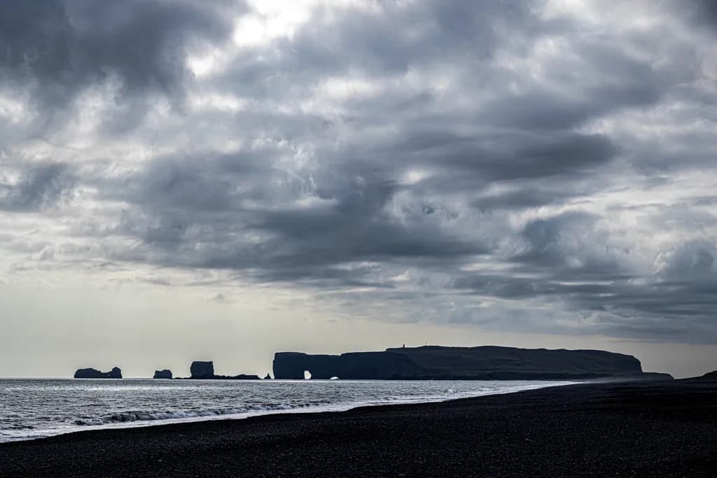 Whispers of the Ocean: A Dramatic Dance of Clouds and Waves