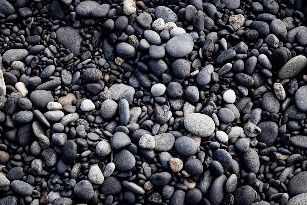 Whispers of the Earth: A Textured Journey Through Gray Stones and Pebbles