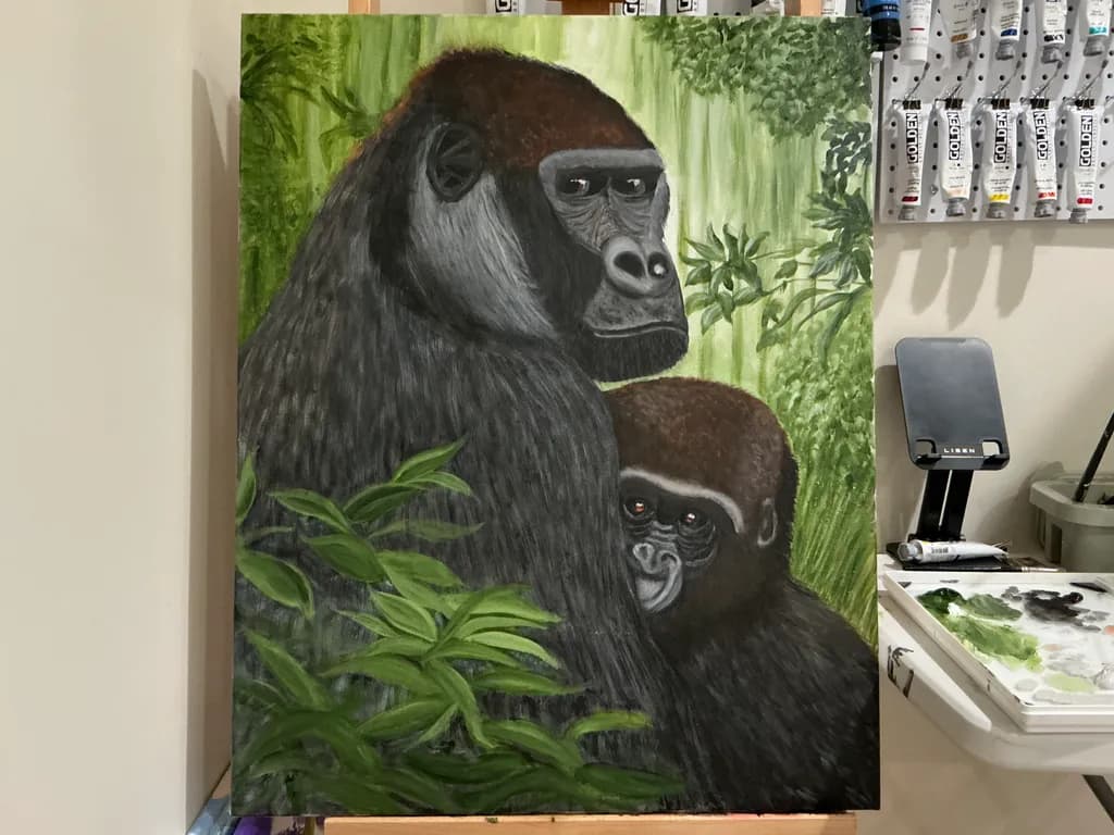 Whispers of the Wild: A Heartfelt Embrace Between Mother and Child Gorillas