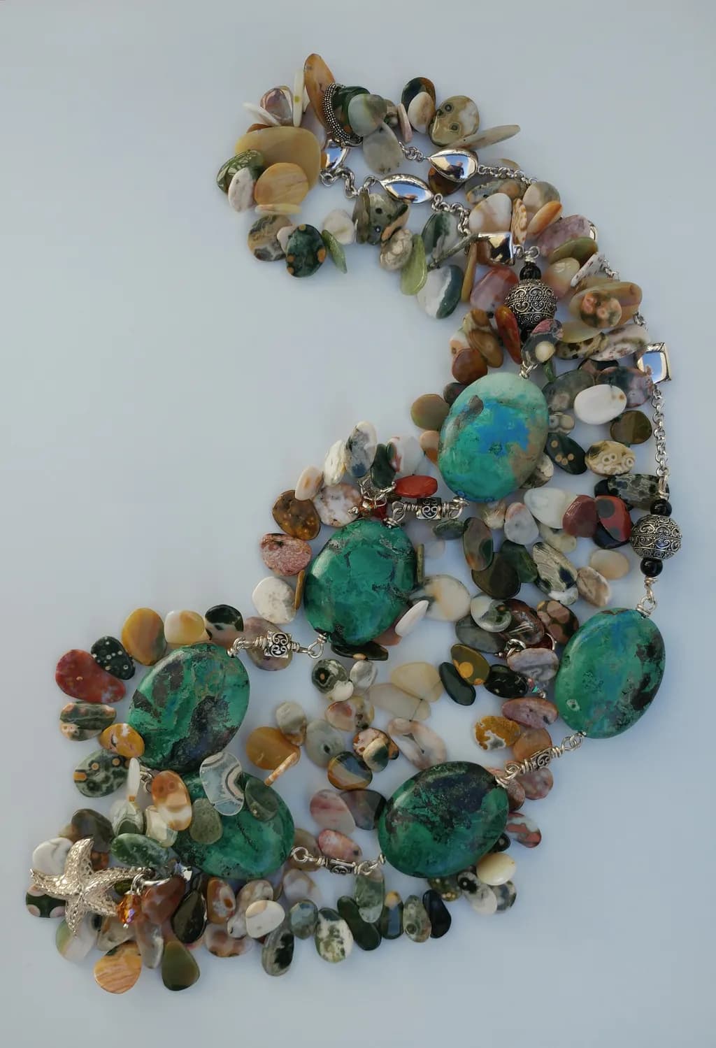 Ocean's Embrace: A Handcrafted Necklace of Natural Stones and Serenity
