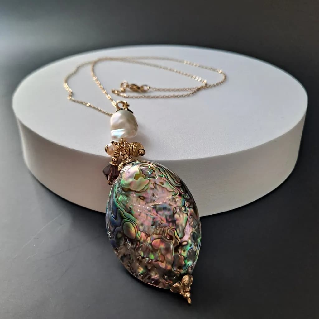 Ocean's Embrace: A Unique Abalone Shell Pendant Necklace with Pearl Accents