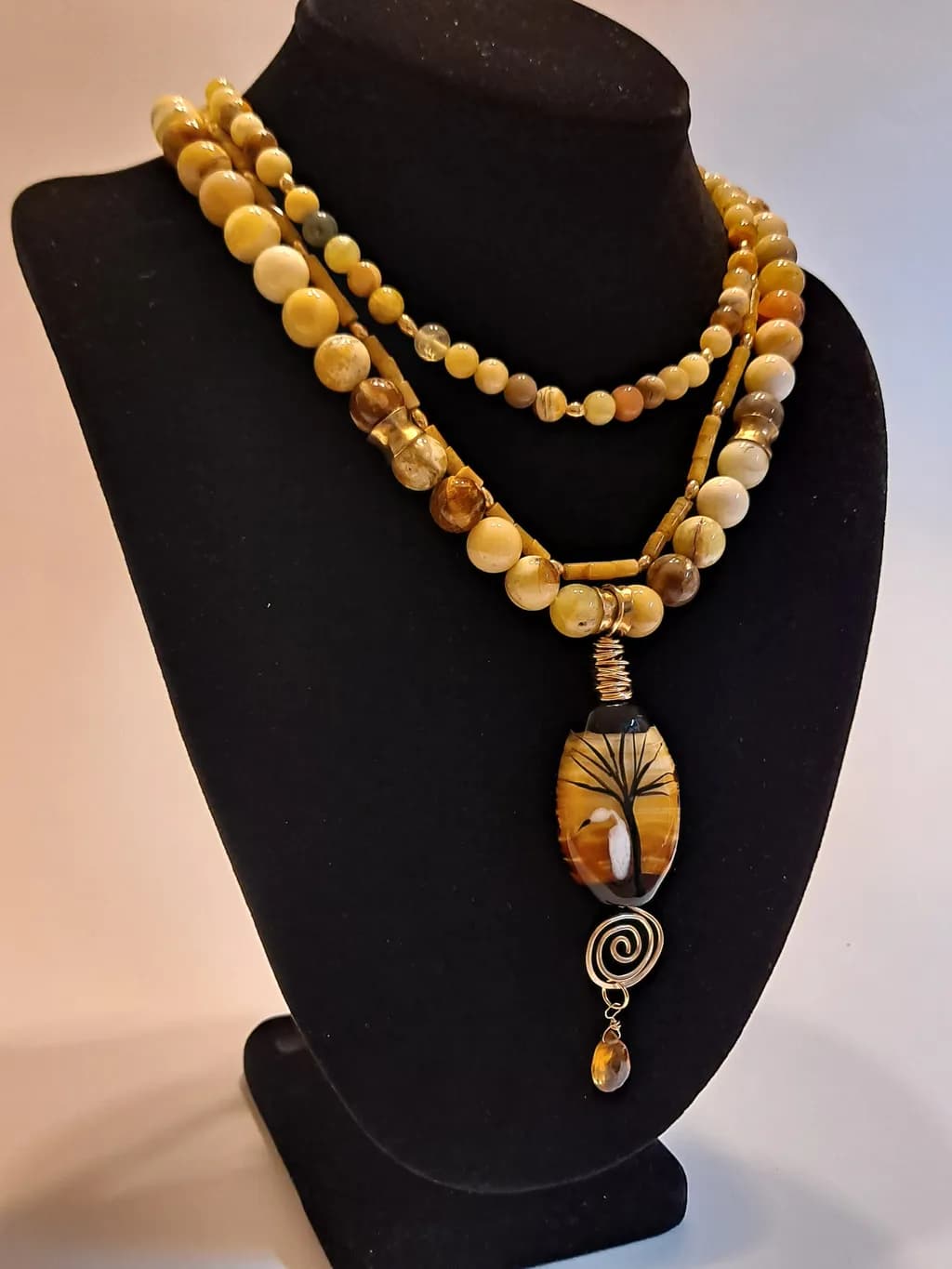Golden Harmony: A Nature-Inspired Multi-Strand Necklace with Unique Agate Pendant
