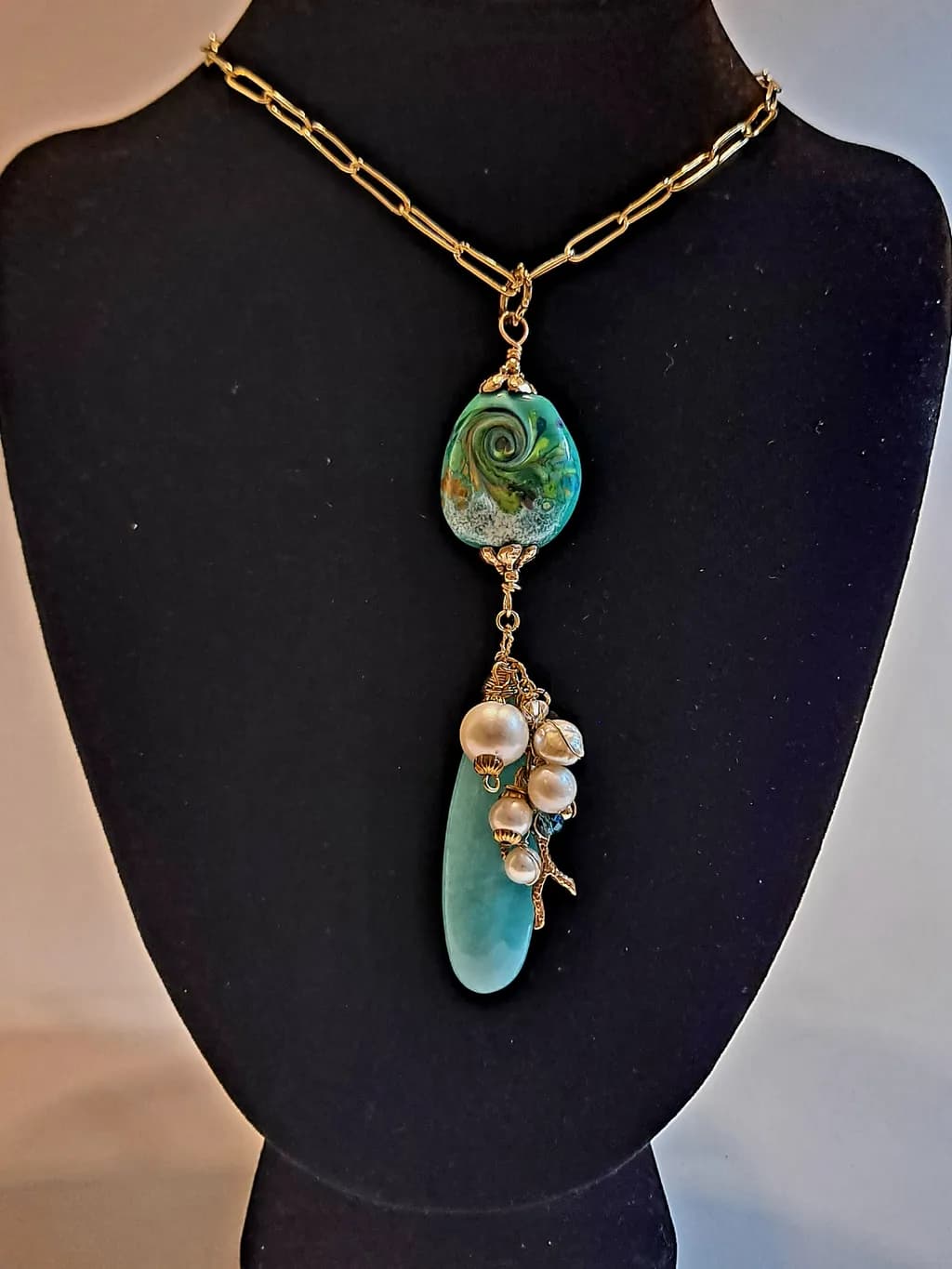Elegant Handcrafted Gemstone Necklace with Unique Swirl Design and Pearls