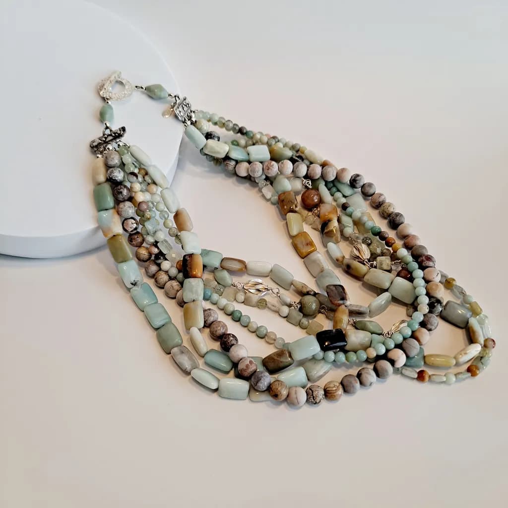 Serenity in Layers: A Multi-Strand Necklace of Earthy Elegance