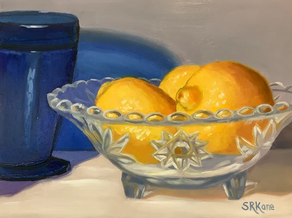 Lemon Delight: A Vibrant Still Life with Glassware and Blue Hues
