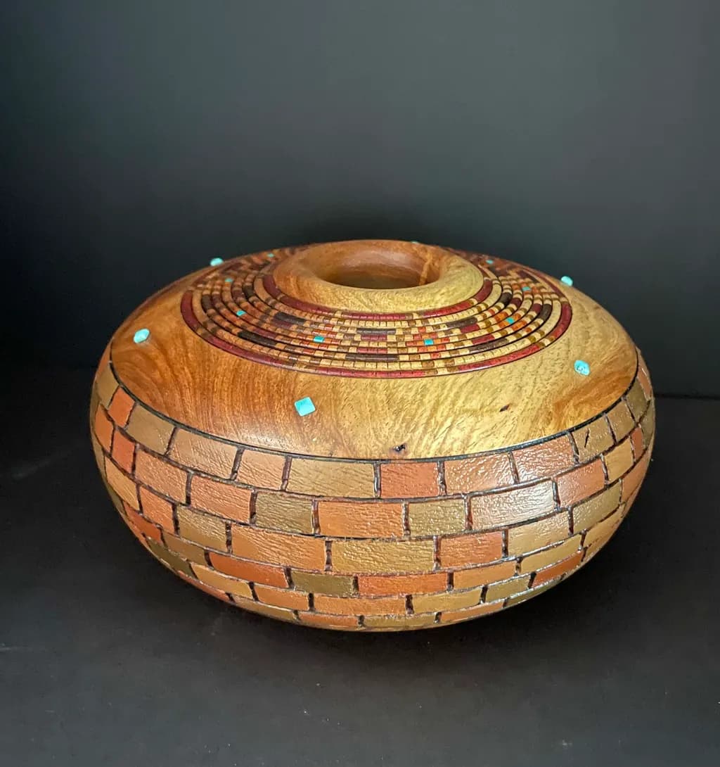 Whispers of the Earth: A Handcrafted Wooden Vessel with Intricate Mosaic Design