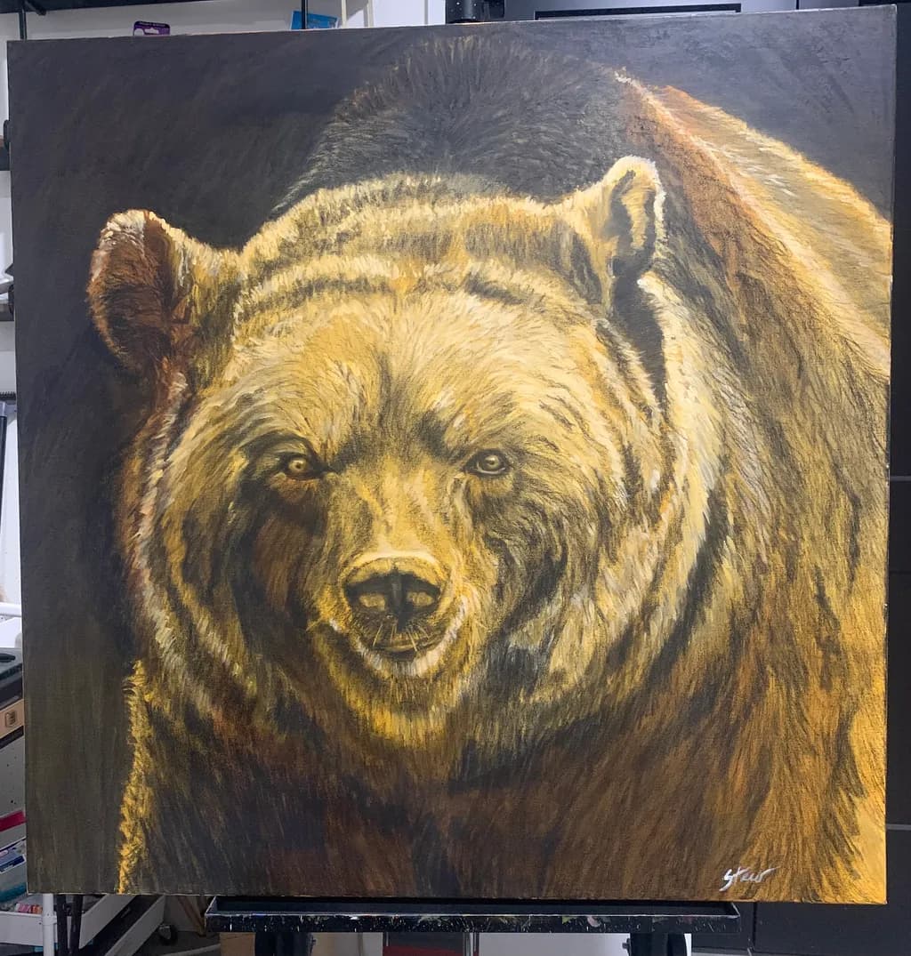Majestic Presence: The Golden Grizzly Bear in Nature's Embrace