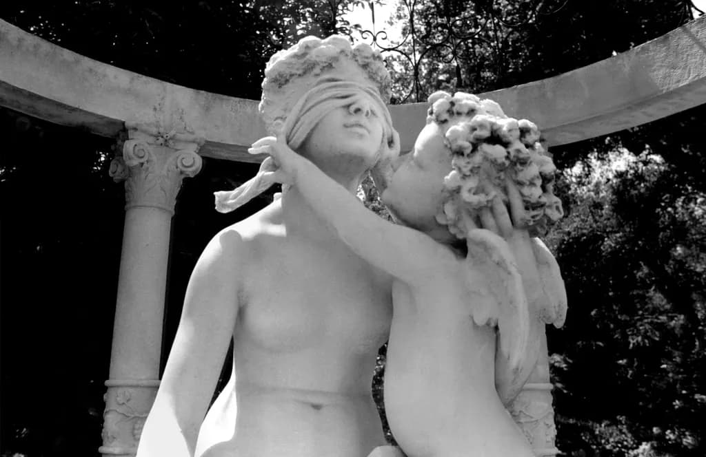 Whispers of Innocence: A Cherubic Embrace in Stone