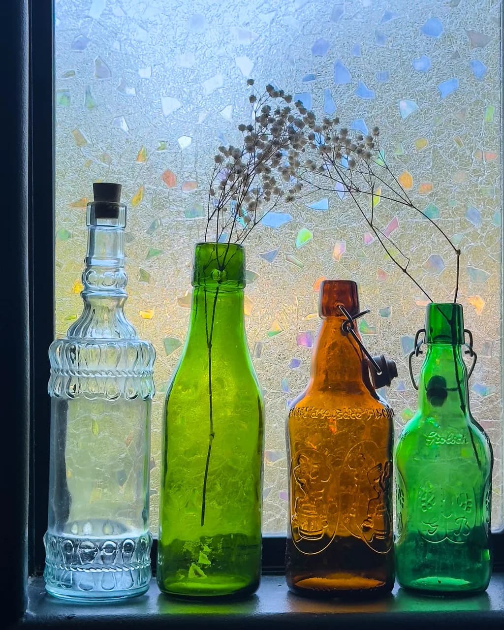 Bottled Whimsy: A Colorful Collection of Vintage Vessels with a Floral Twist