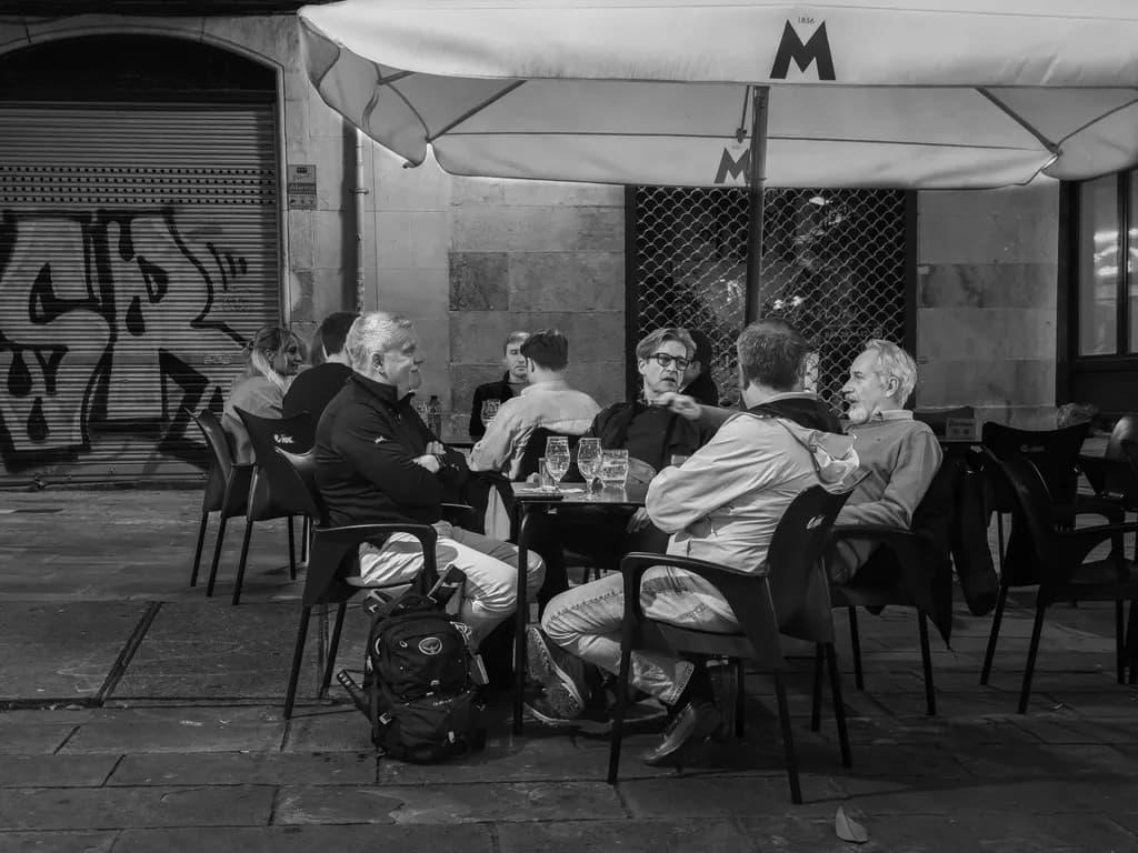 Evening Conversations: A Black and White Snapshot of Connection and Community