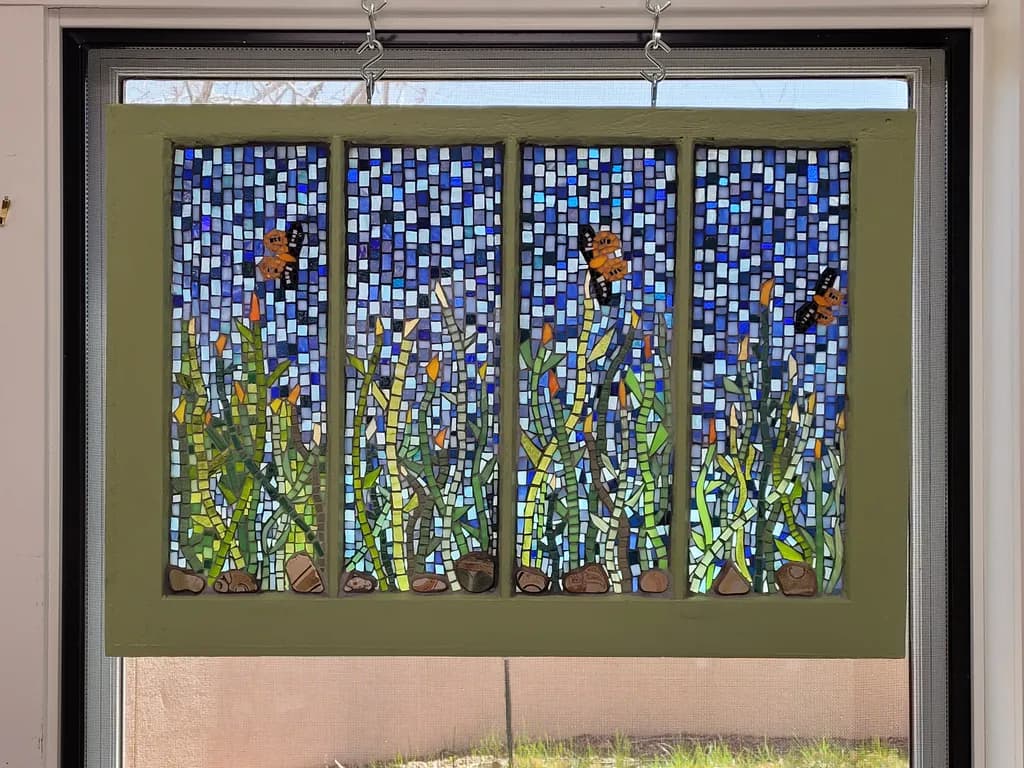Whimsical Garden Mosaic: A Dance of Butterflies and Blooms in Vibrant Glass