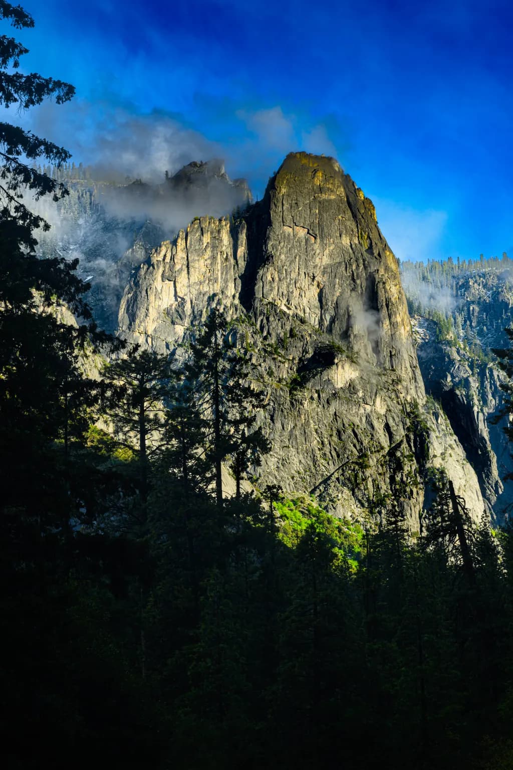 Majestic Peaks: Embracing Nature's Grandeur in a Dance of Light and Shadow
