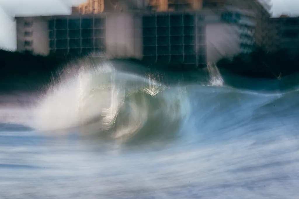 Whispers of the Urban Wave: An Abstract Dance of Water and Light