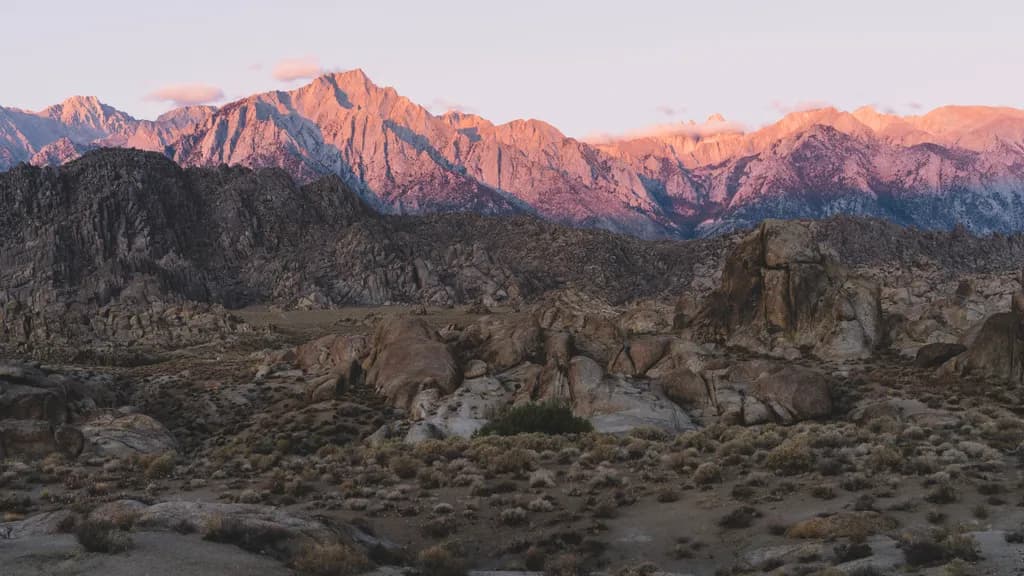 Whispers of Dawn: A Mountain's Poetic Embrace in Twilight's Glow