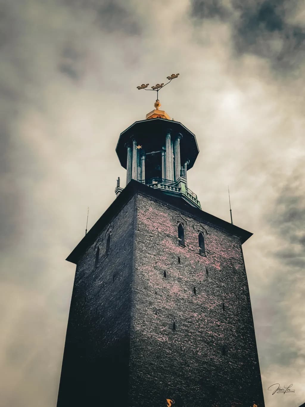 Majestic Tower Beneath the Clouds: A Historical Architectural Landmark