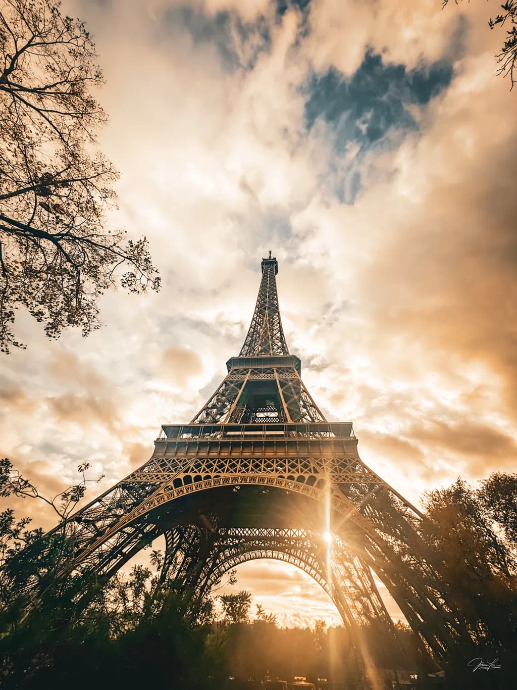 Eiffel Tower: A Golden Embrace Beneath the Parisian Sky