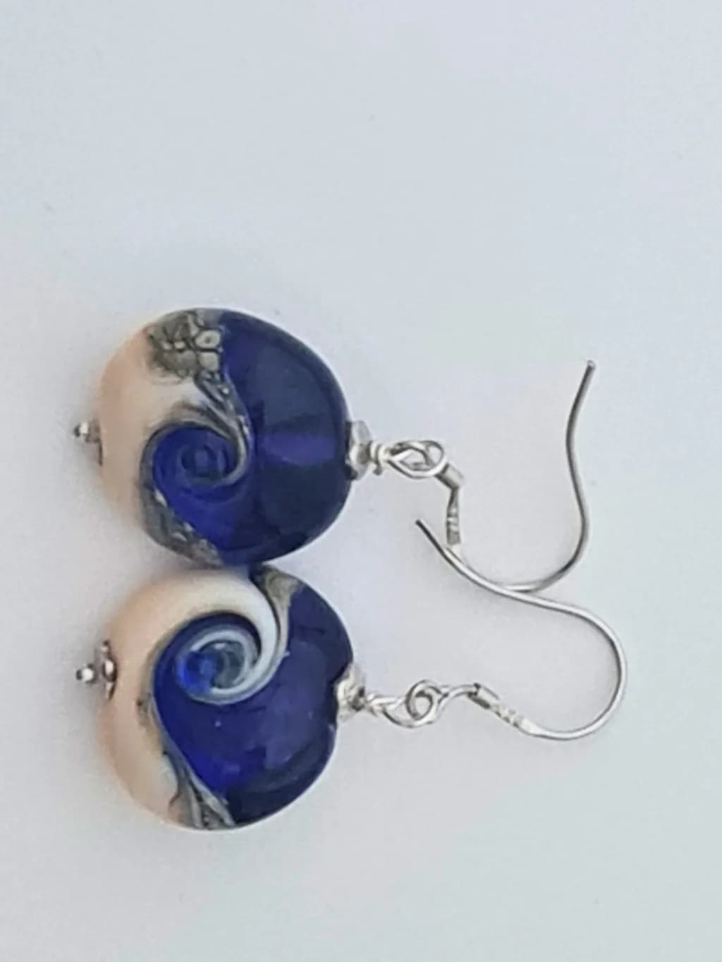 Whimsical Blue Swirl Earrings: Handcrafted Metal Jewelry for Unique Style
