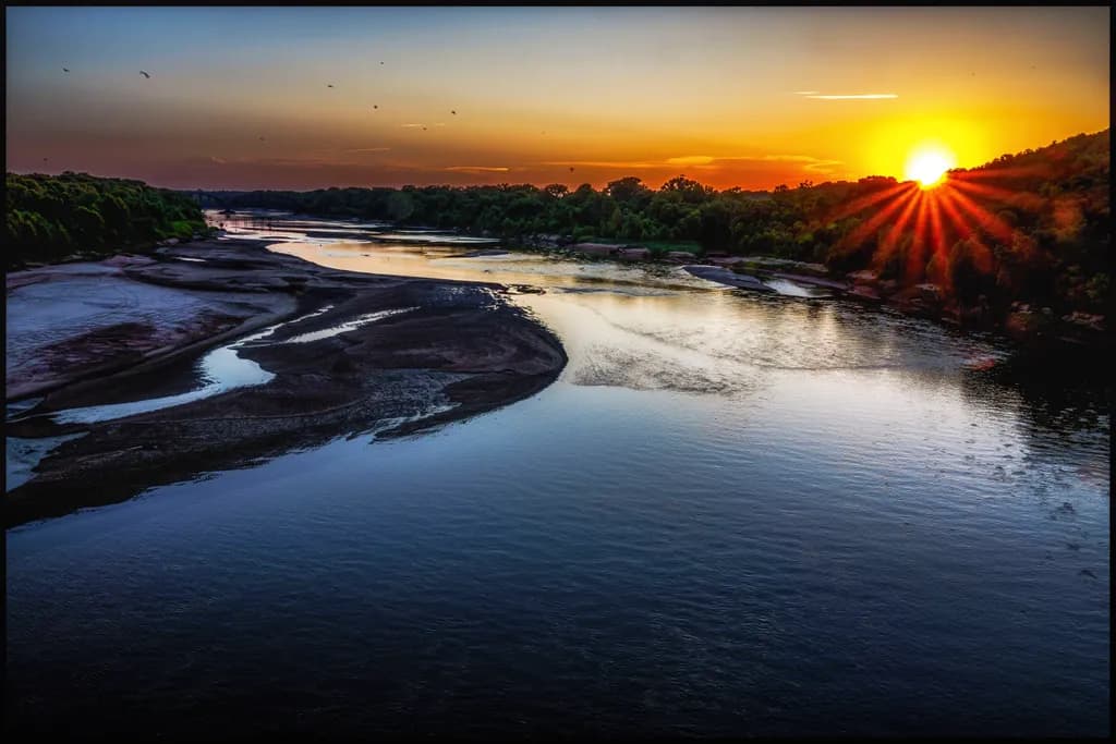 Serenity at Dusk: A Tranquil River Sunset Reflection