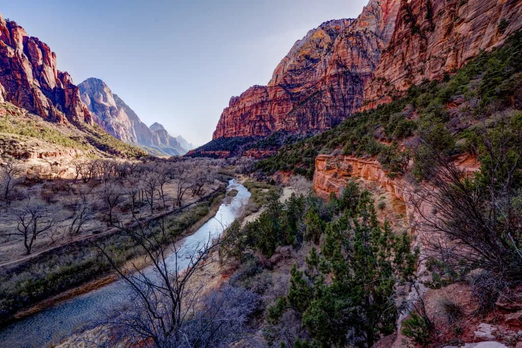 Serenity in the Canyon: A Tranquil River Journey Through Majestic Mountains