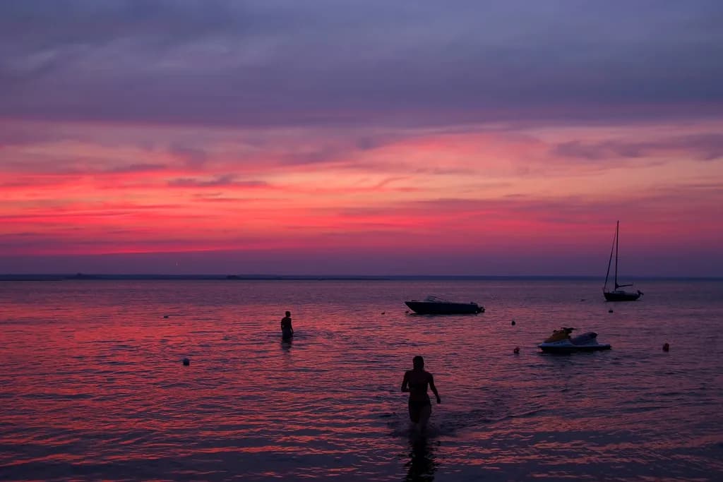 Serenity at Sunset: A Tranquil Reflection on Water's Edge