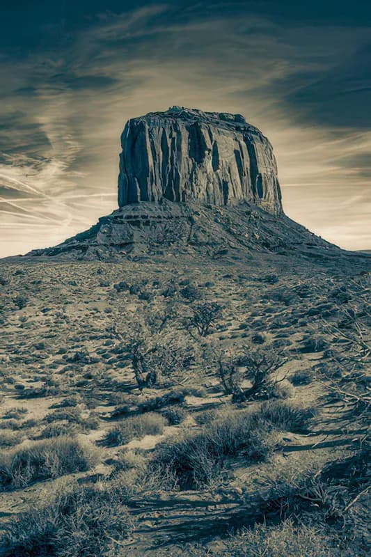 Majestic Monolith: A Serene Desert Landscape at Dusk