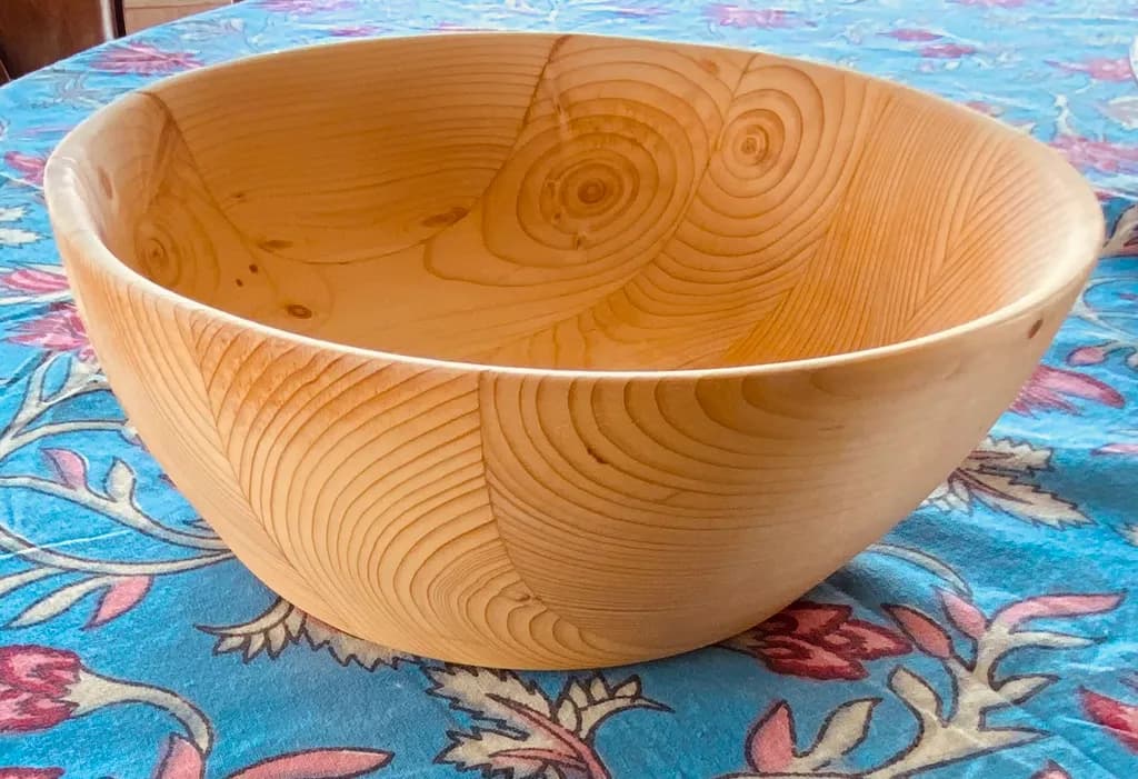 Natural Elegance: Handcrafted Wooden Bowl with Unique Texture and Warmth
