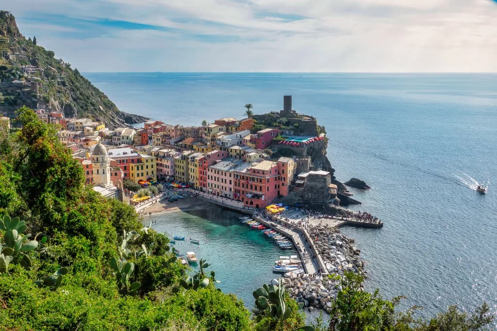 Coastal Serenity: A Colorful Village Embracing the Ocean's Embrace