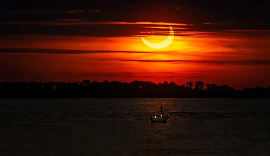 Whispers of Twilight: A Serene Sunset Over Calm Waters