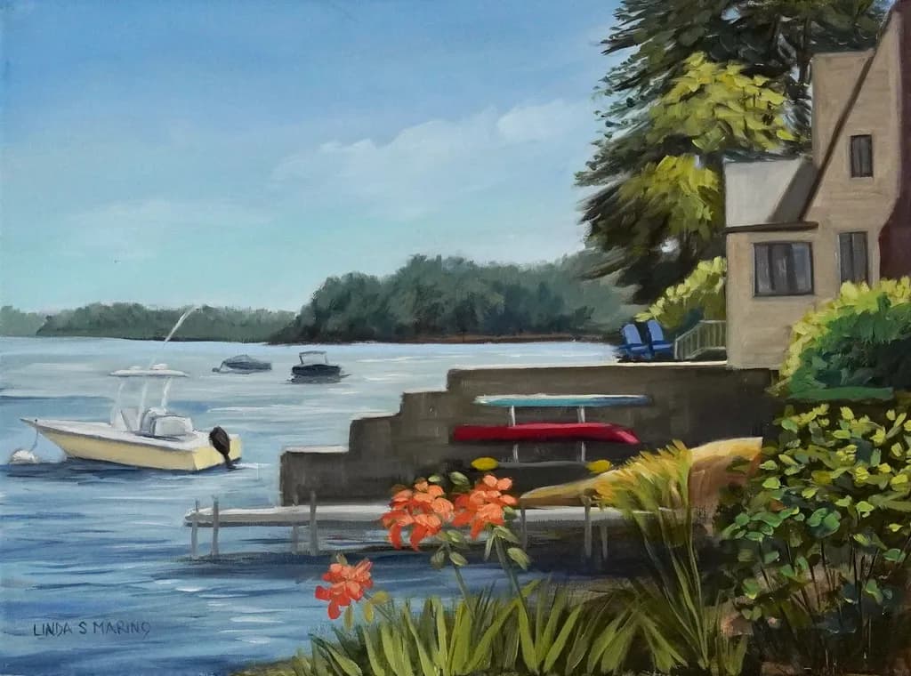 Serenity by the Water: A Tranquil Landscape of Boats and Blooms