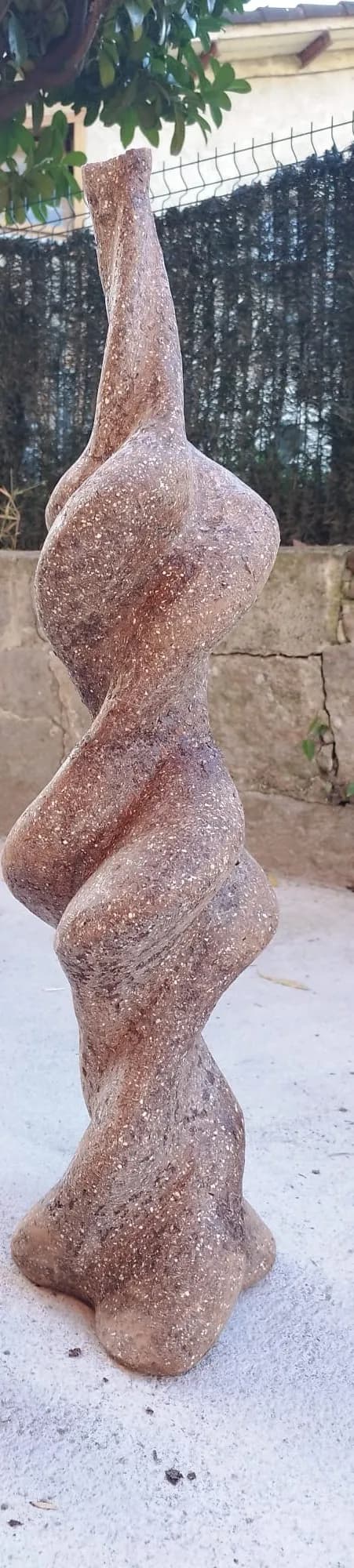 Twisted Elegance: An Abstract Stone Sculpture Celebrating Texture and Form