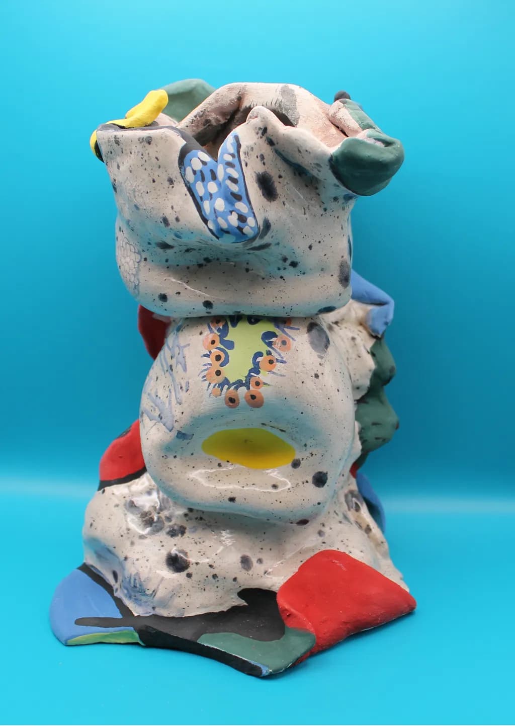 Whimsical Harmony: A Playful Ceramic Sculpture of Colorful Textures and Forms