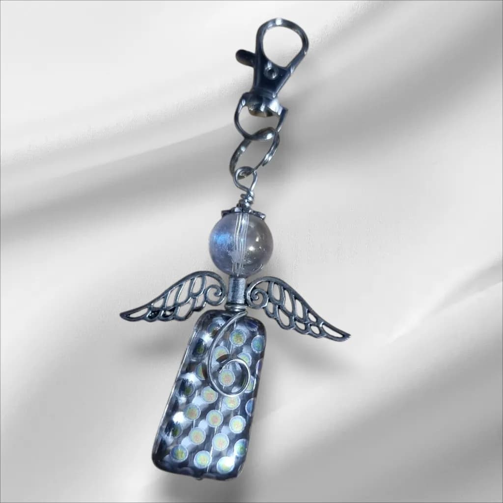 Whimsical Guardian: A Celestial Angel Charm with Iridescent Touches