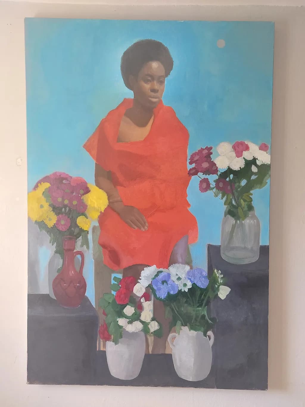 Radiant Serenity: A Portrait of Grace Amidst Blossoms and Colorful Vases